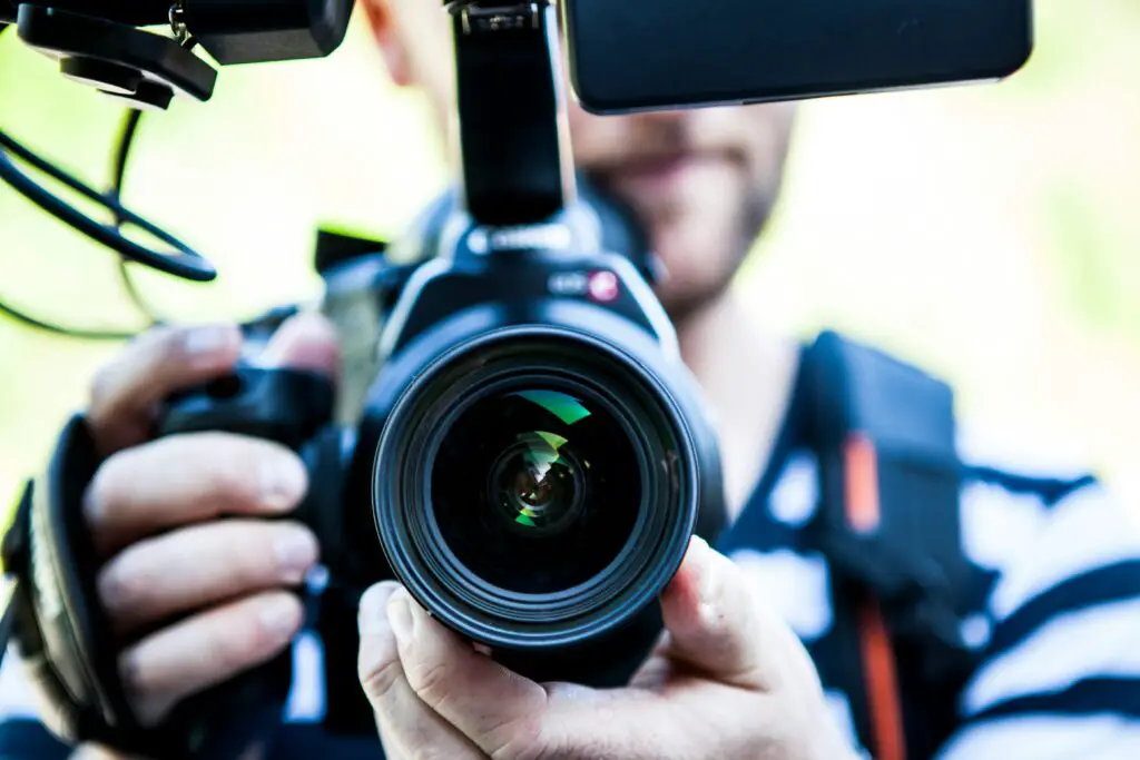 Cameraman holding a camera